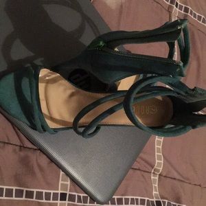I am selling a green high heel